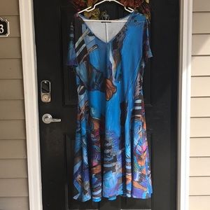 Such beautiful colors blended together in this comfortable dress from Noracora